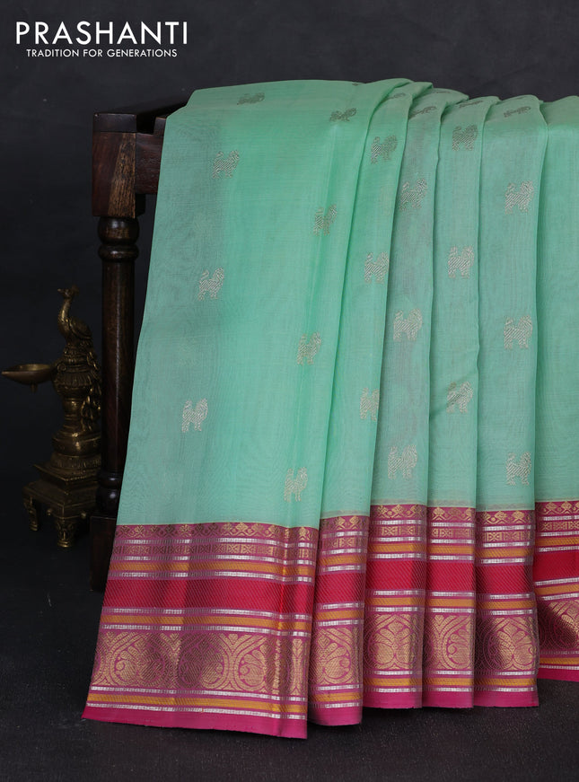 Kora kanchipuram silk saree pista green and pink with zari woven buttas and rich zari woven border