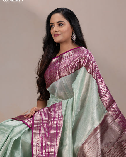Kora kanchipuram tissue silk saree pastel blue and purple with allover zari woven brocade weaves and long zari woven border