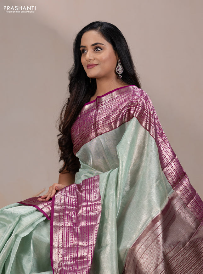 Kora kanchipuram tissue silk saree pastel blue and purple with allover zari woven brocade weaves and long zari woven border