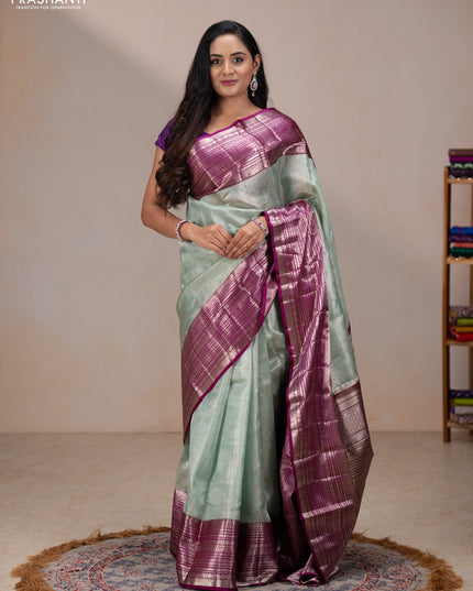 Kora kanchipuram tissue silk saree pastel blue and purple with allover zari woven brocade weaves and long zari woven border