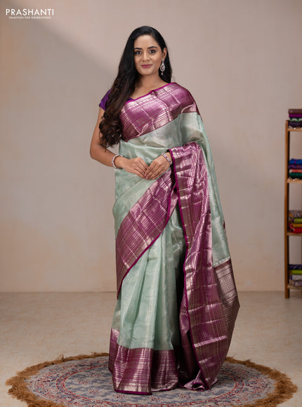 Kora kanchipuram tissue silk saree pastel blue and purple with allover zari woven brocade weaves and long zari woven border