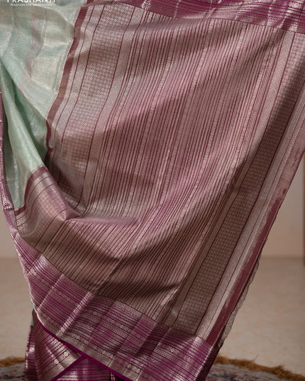 Kora kanchipuram tissue silk saree pastel blue and purple with allover zari woven brocade weaves and long zari woven border