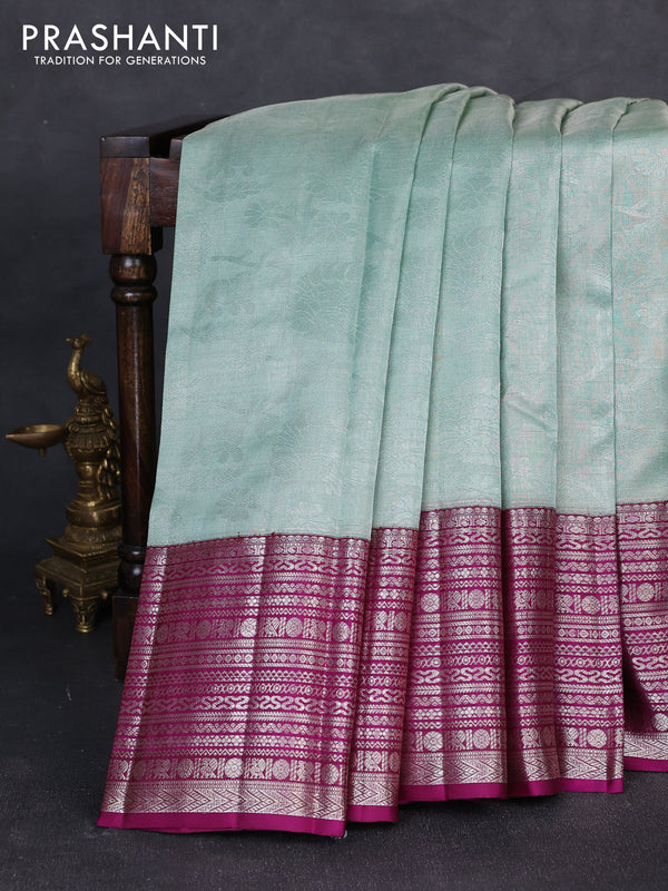 Kora kanchipuram tissue silk saree pastel blue and purple with allover zari woven brocade weaves and long zari woven border