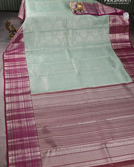 Kora kanchipuram tissue silk saree pastel blue and purple with allover zari woven brocade weaves and long zari woven border