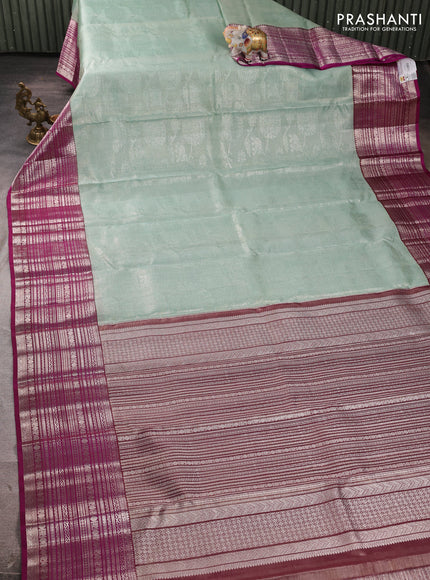 Kora kanchipuram tissue silk saree pastel blue and purple with allover zari woven brocade weaves and long zari woven border