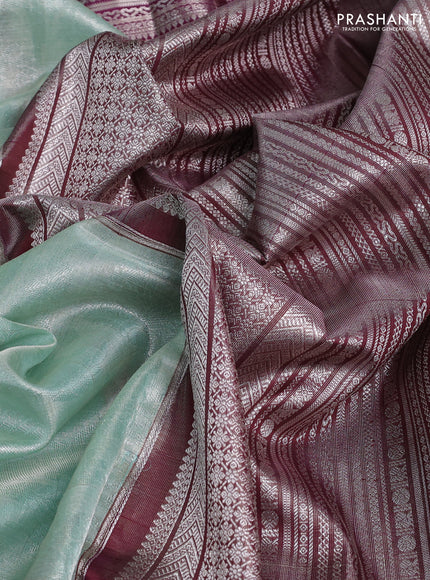 Kora kanchipuram tissue silk saree pastel blue and purple with allover zari woven brocade weaves and long zari woven border