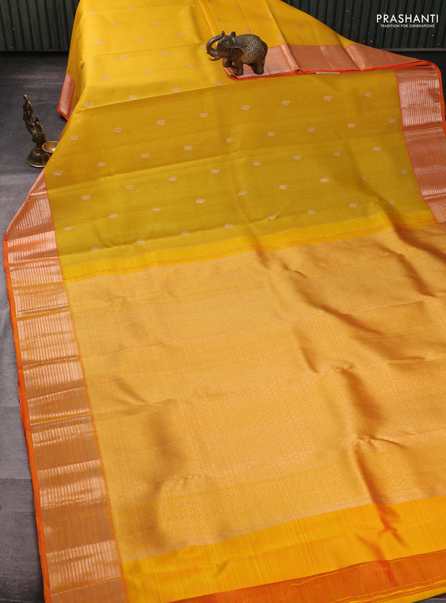 Kora kanchipuram silk saree yellow and orange with zari woven buttas and rich zari woven border