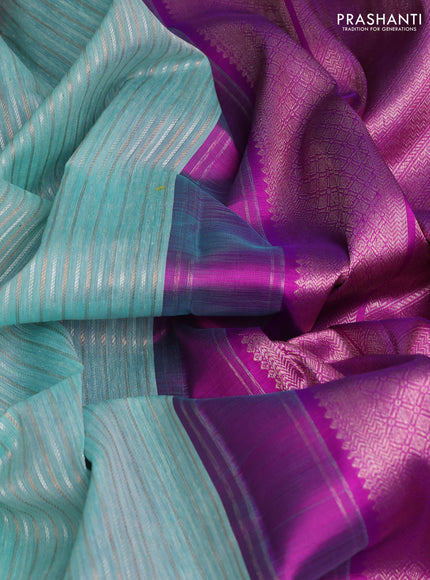 Kora kanchipuram silk saree teal blue and purple with allover silver & gold zari weaves and ganga jamuna border