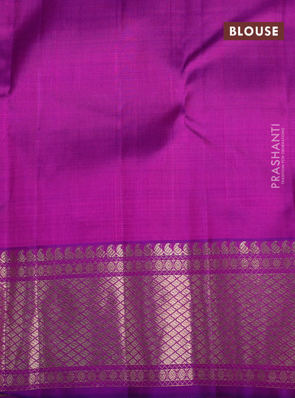 Kora kanchipuram silk saree teal blue and purple with allover silver & gold zari weaves and ganga jamuna border