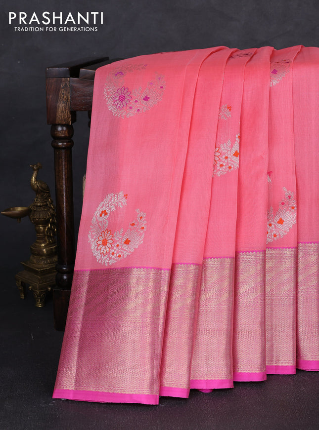 Kora kanchipuram silk saree peach pink and pink with silver zari woven buttas and rich zari woven border