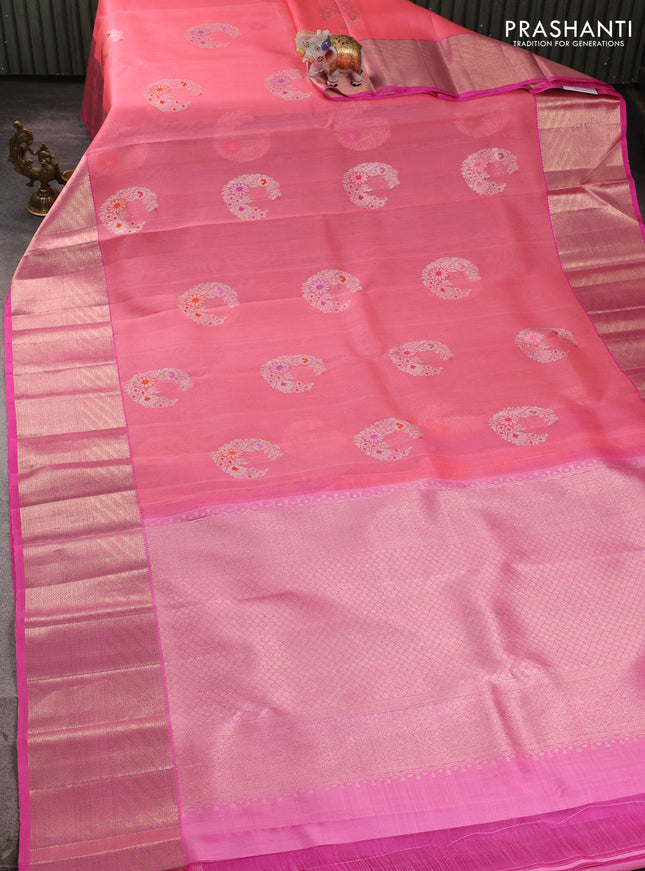 Kora kanchipuram silk saree peach pink and pink with silver zari woven buttas and rich zari woven border