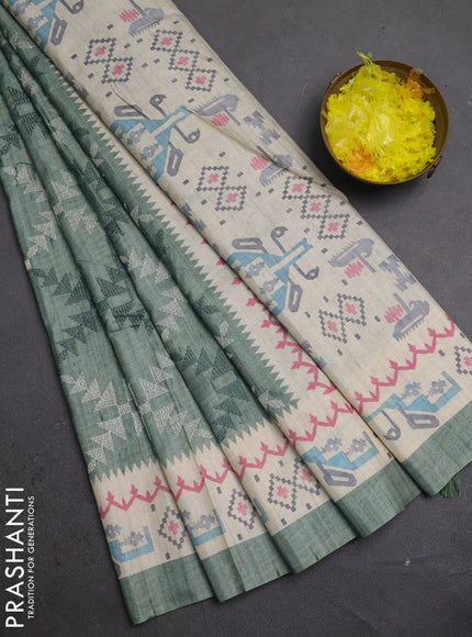 Art tussar saree pastel green and cream with allover embroidery work and printed border