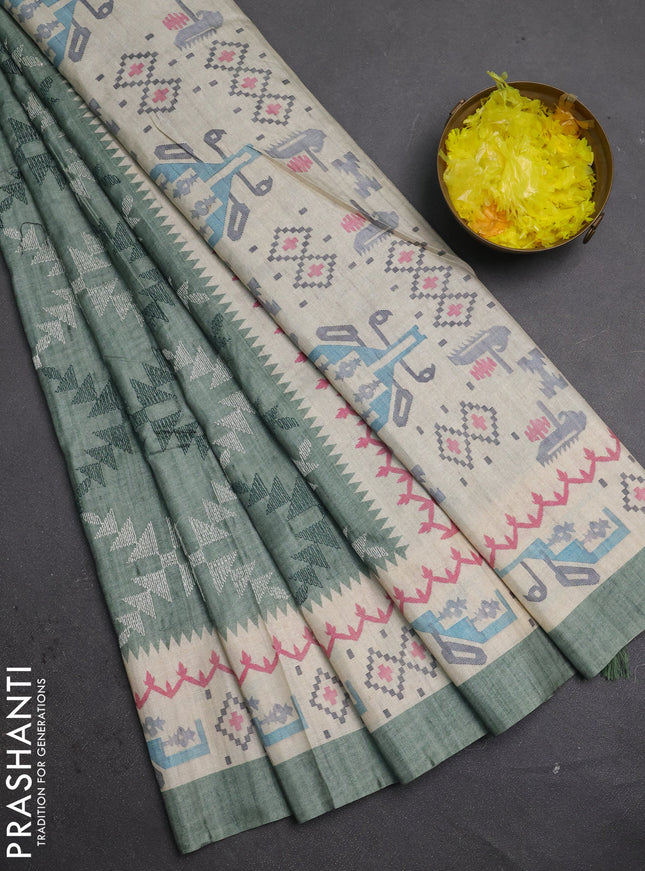 Art tussar saree pastel green and cream with allover embroidery work and printed border