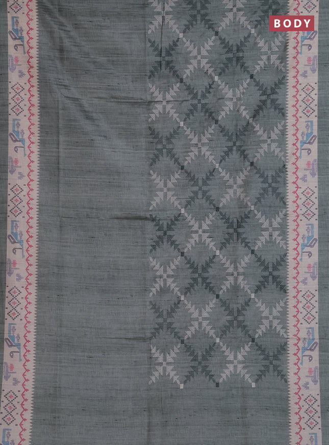 Art tussar saree pastel green and cream with allover embroidery work and printed border