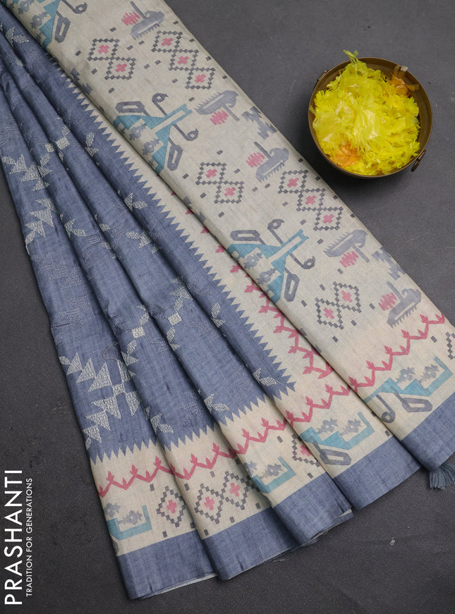 Art tussar saree grey and cream with allover embroidery work and printed border