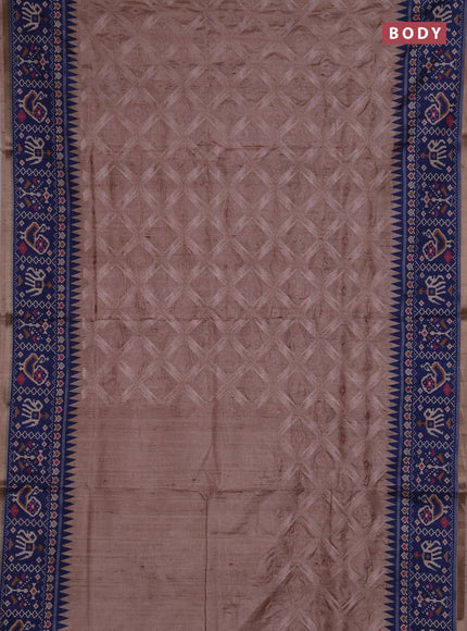 Art tussar saree beige and navy blue with allover embroidery work and patola printed border