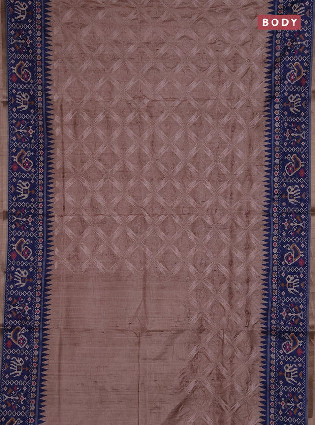 Art tussar saree beige and navy blue with allover embroidery work and patola printed border