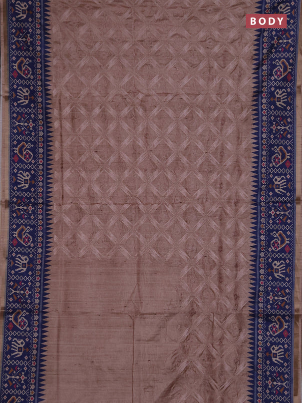Art tussar saree beige and navy blue with allover embroidery work and patola printed border