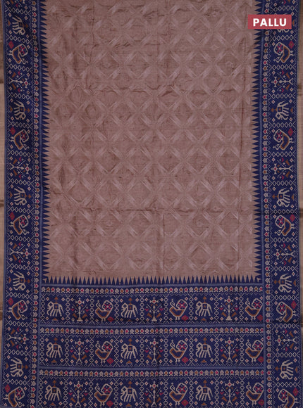 Art tussar saree beige and navy blue with allover embroidery work and patola printed border