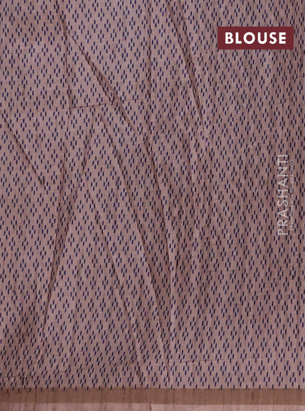 Art tussar saree beige and navy blue with allover embroidery work and patola printed border
