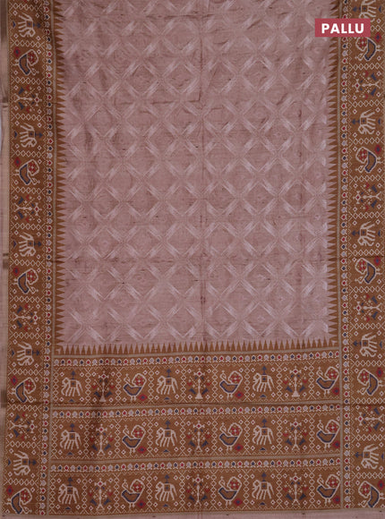Art tussar saree beige and dark mustard with allover embroidery work and patola printed border