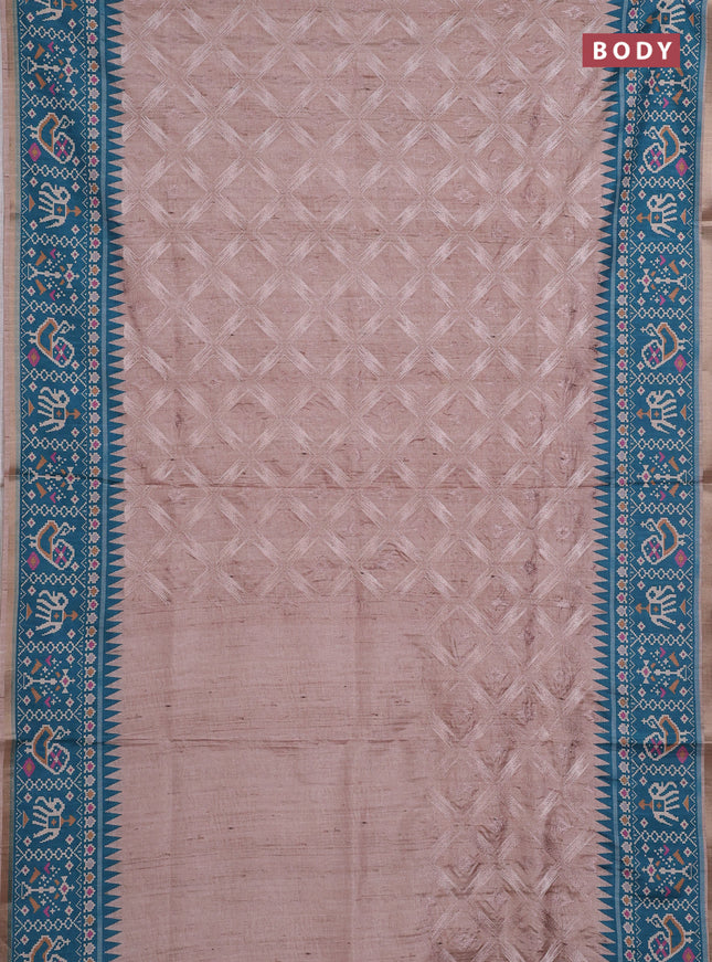 Art tussar saree beige and teal green with allover embroidery work and patola printed border