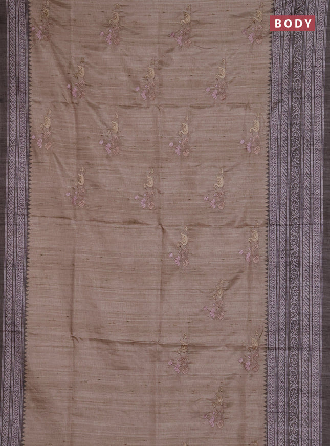 Art tussar saree beige and pastel green with allover embroidery buttas and long printed border