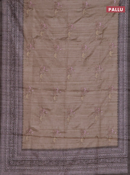 Art tussar saree beige and pastel green with allover embroidery buttas and long printed border
