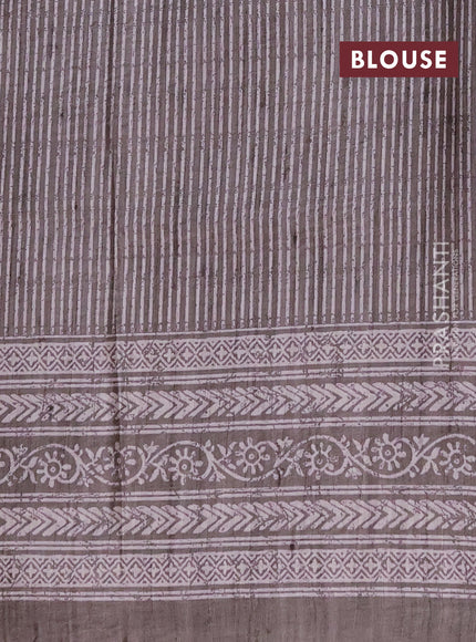 Art tussar saree beige and pastel green with allover embroidery buttas and long printed border
