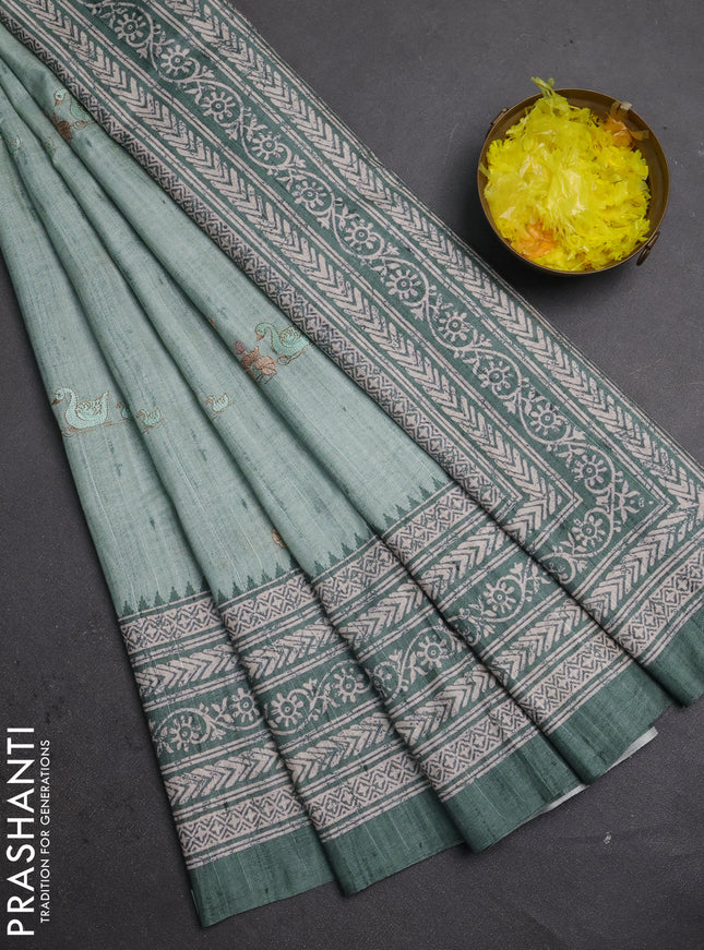 Art tussar saree pastel green and green with allover embroidery buttas and long printed border