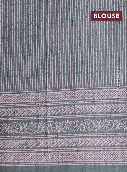 Art tussar saree pastel green and green with allover embroidery buttas and long printed border