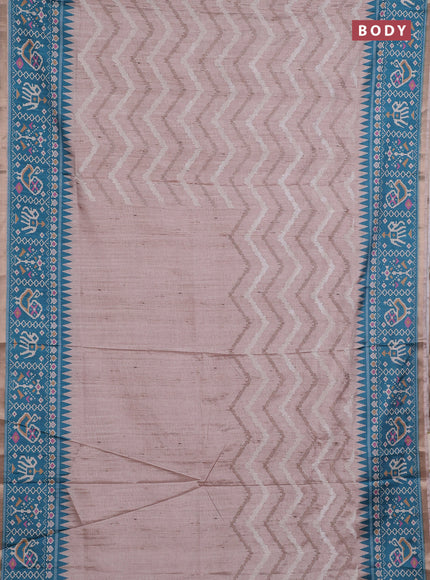 Art tussar saree beige and teal green shade with allover embroidery work and patola printed border