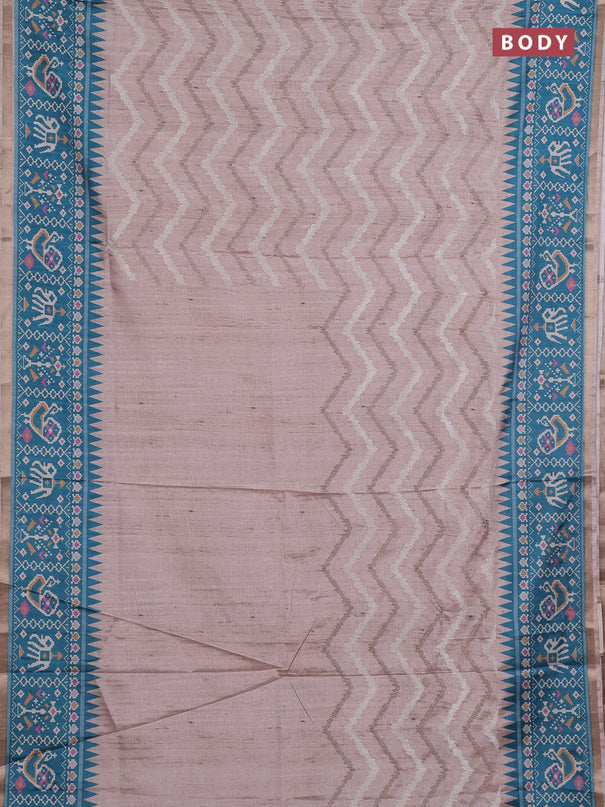 Art tussar saree beige and teal green shade with allover embroidery work and patola printed border