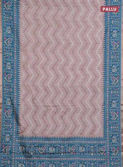 Art tussar saree beige and teal green shade with allover embroidery work and patola printed border