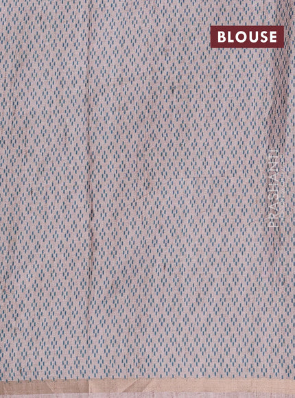 Art tussar saree beige and teal green shade with allover embroidery work and patola printed border