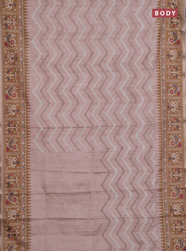 Art tussar saree beige and dark mustard with allover embroidery work and patola printed border