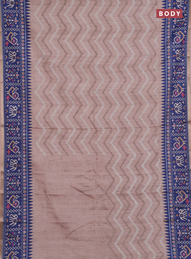 Art tussar saree beige and blue with allover embroidery work and patola printed border