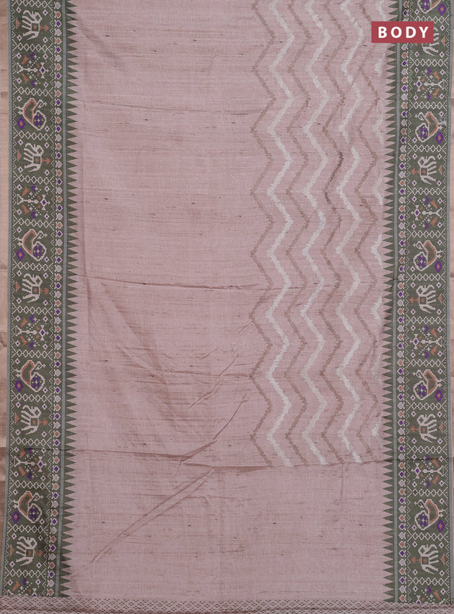 Art tussar saree beige and green with allover embroidery work and patola printed border