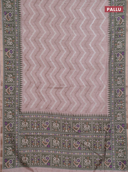 Art tussar saree beige and green with allover embroidery work and patola printed border