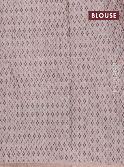 Art tussar saree beige and green with allover embroidery work and patola printed border