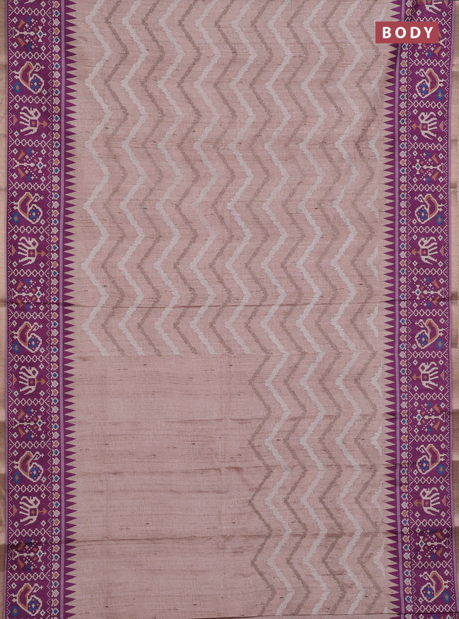 Art tussar saree beige and purple with allover embroidery work and patola printed border