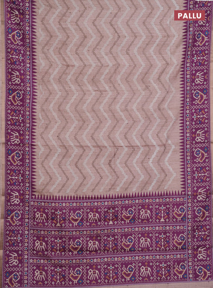 Art tussar saree beige and purple with allover embroidery work and patola printed border