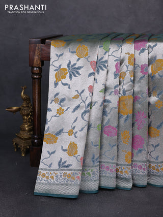 Banarasi raw silk saree peacock green with allover silver zari woven paithani weaves and paithani style border