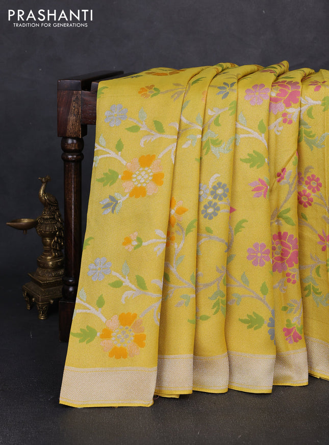 Banarasi raw silk saree yellow with allover silver zari woven paithani weaves and zari woven border