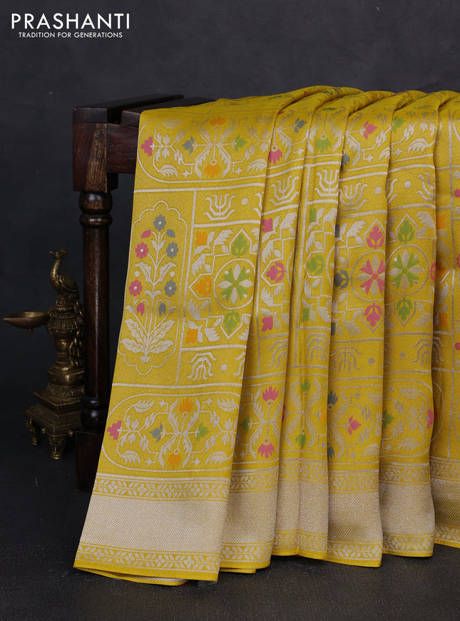 Banarasi raw silk saree yellow with allover silver zari woven paithani weaves and zari woven border