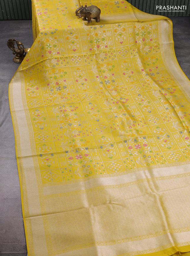 Banarasi raw silk saree yellow with allover silver zari woven paithani weaves and zari woven border