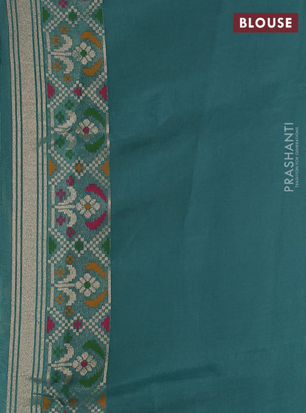 Banarasi raw silk saree teal green with allover silver zari woven brocade weaves and paithani style border