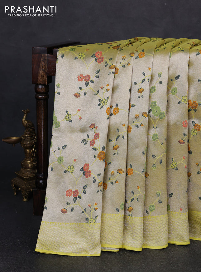 Banarasi raw silk saree lime green with allover silver zari woven paithani weaves and zari woven border