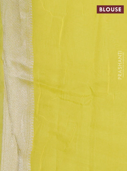 Banarasi raw silk saree lime green with allover silver zari woven paithani weaves and zari woven border