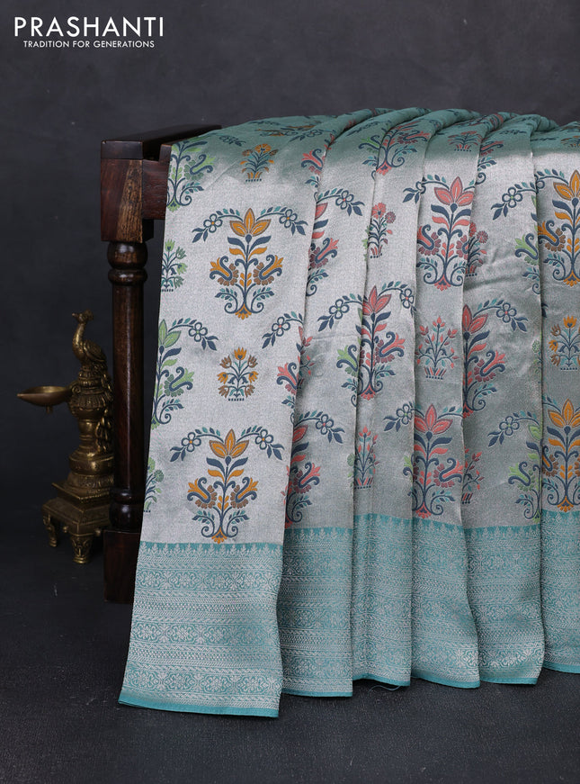Banarasi raw silk saree teal green with allover silver zari woven paithani weaves and zari woven border